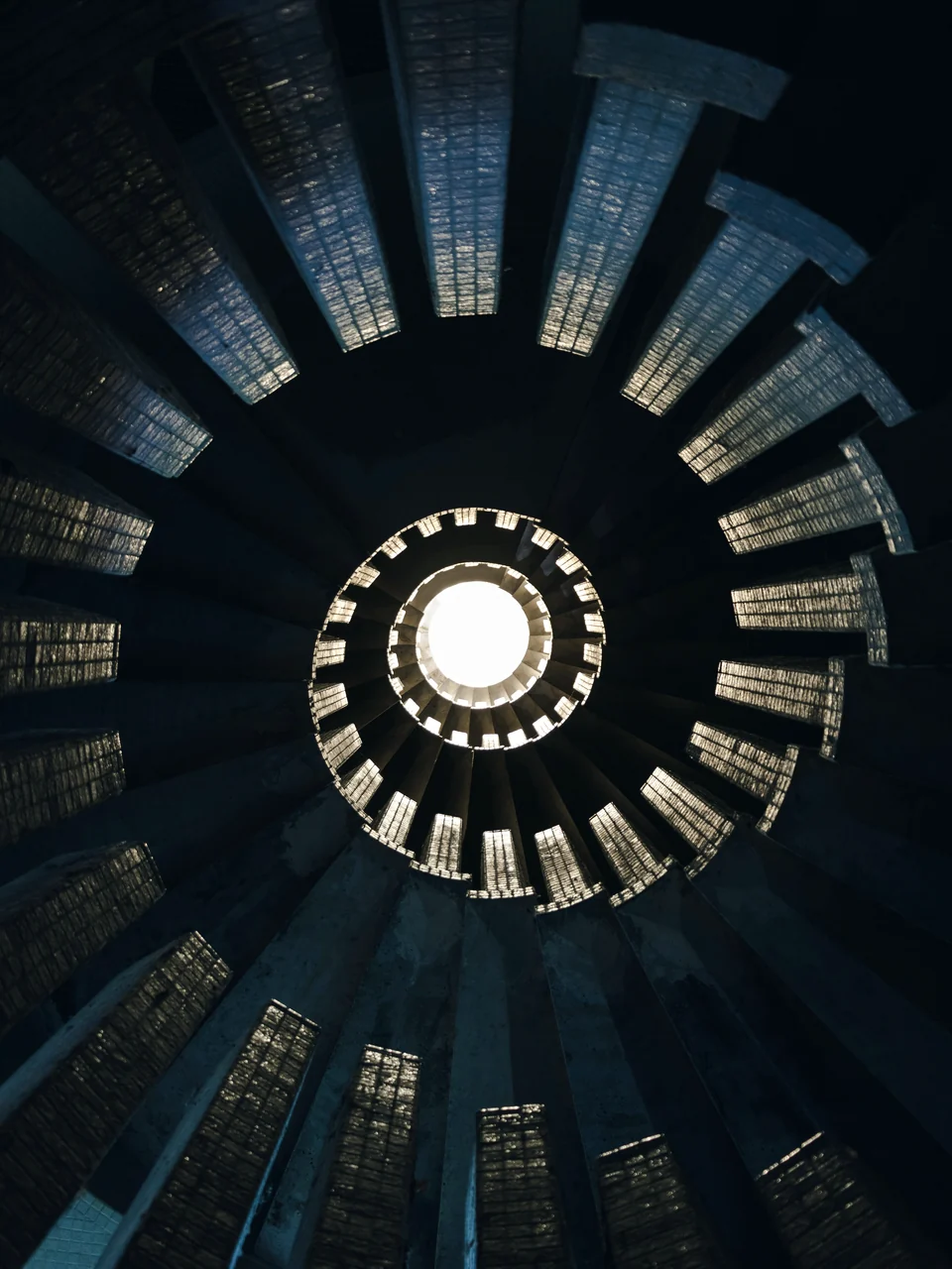 A spiral staircase seen from below